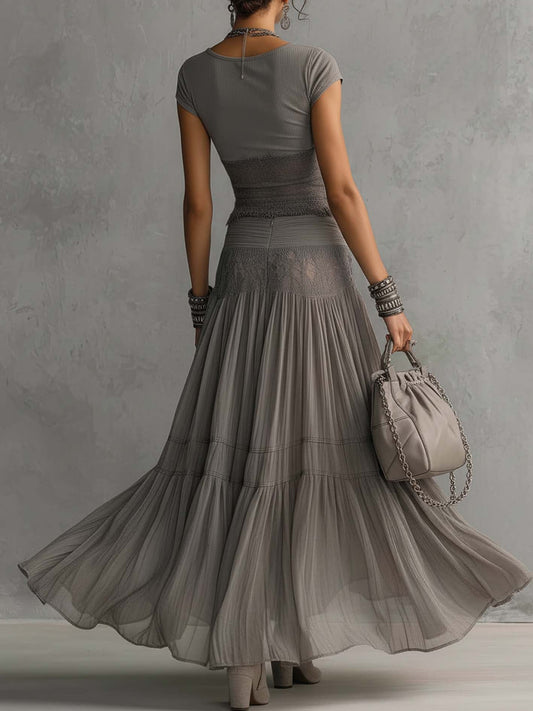Top gris transparente con paneles de encaje y conjunto de falda