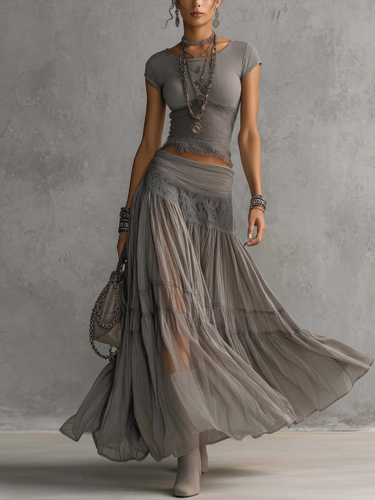 Top gris transparente con paneles de encaje y conjunto de falda