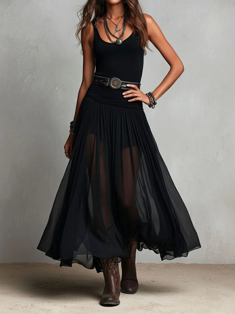 Top negro sin mangas con falda maxi