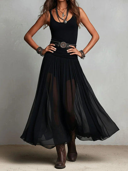 Top negro sin mangas con falda maxi