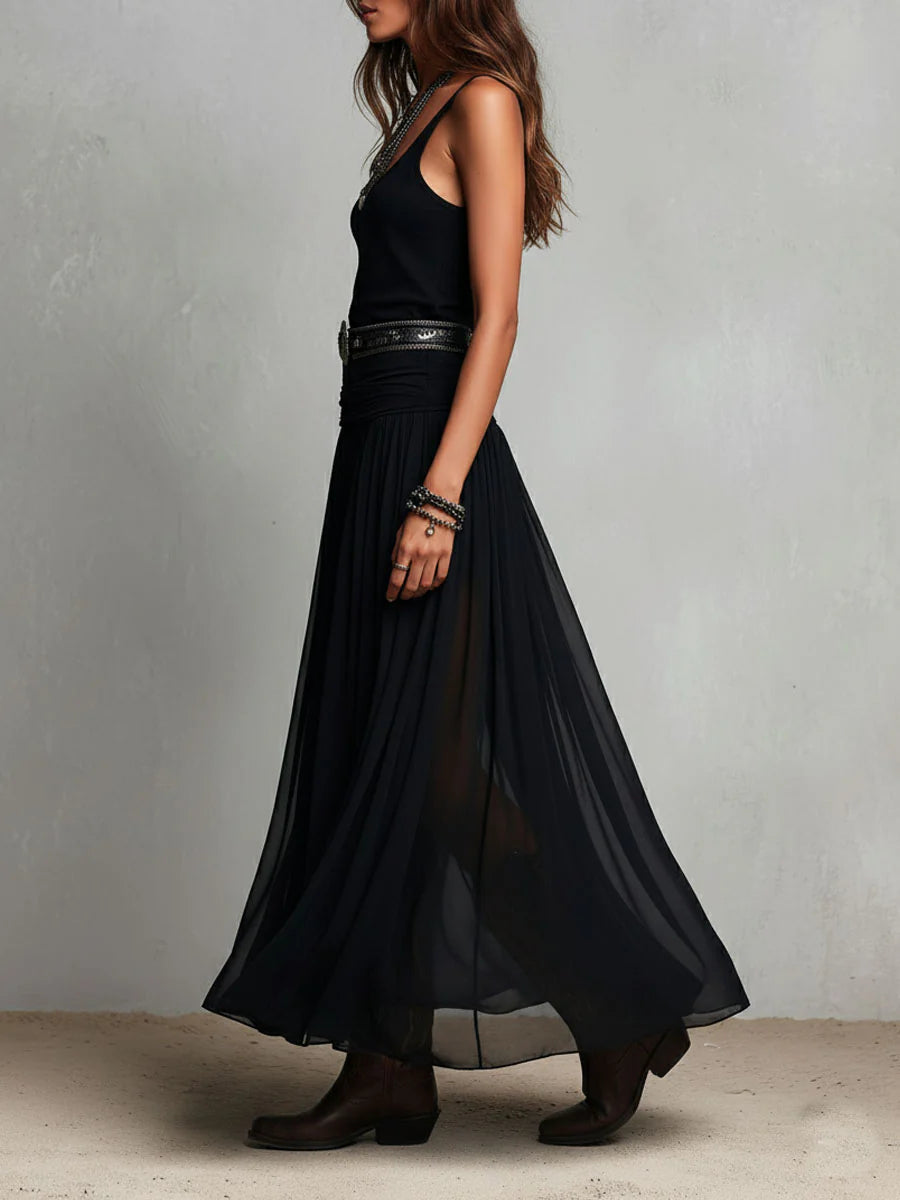 Top negro sin mangas con falda maxi